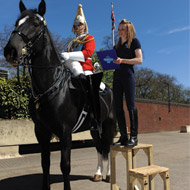 Blue cross with horse cavalry