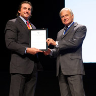 Dr. Weston Davis (Left) receives his award from Paul Jepson