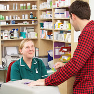 receptionist with client in practice