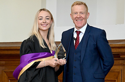 Adam Henson presenting award